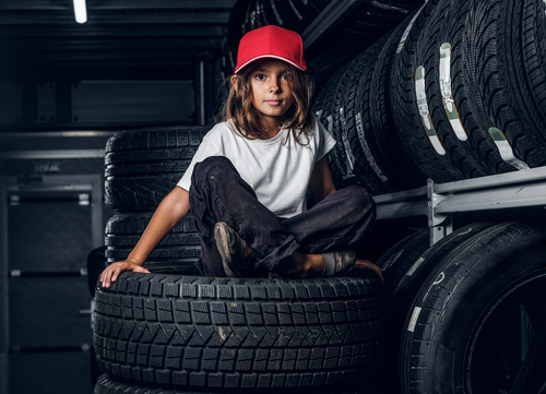 Portrait Of A Girl In Dark Tyre Storage 2023 11 27 05 32 16 Utc (1)